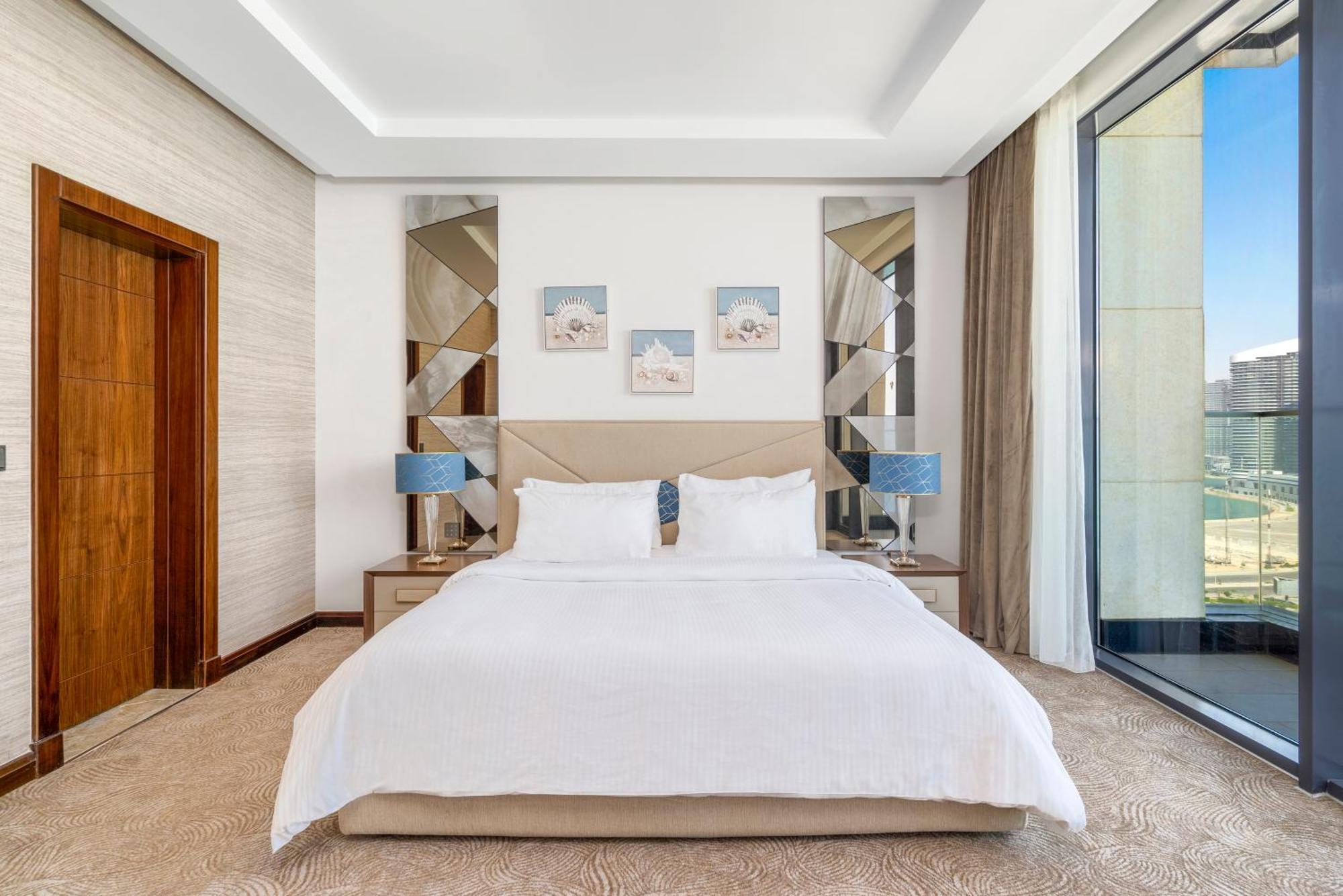 Rixos Premium Alamein El Alamein Rum bild A bedroom at the hotel