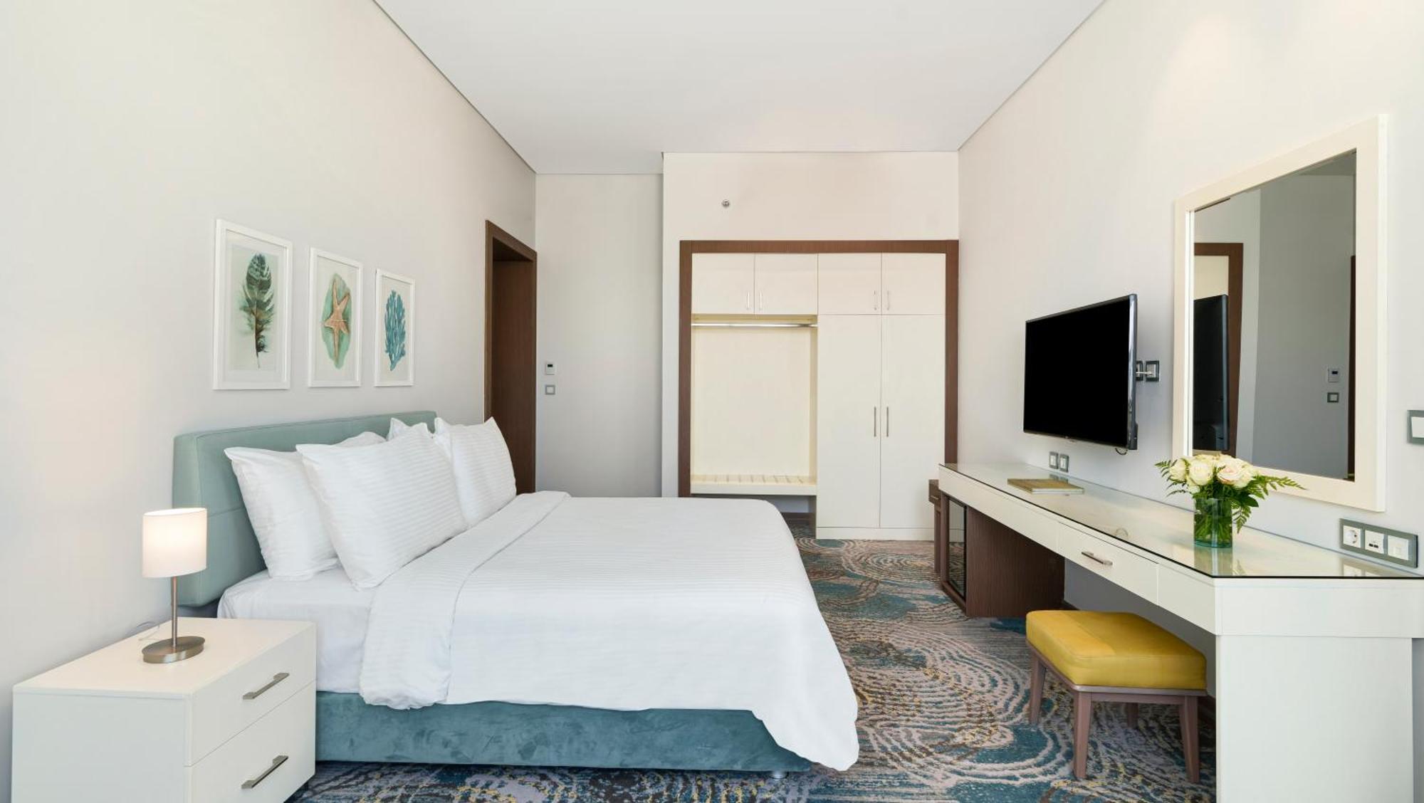Rixos Premium Alamein El Alamein Rum bild A bedroom at the hotel