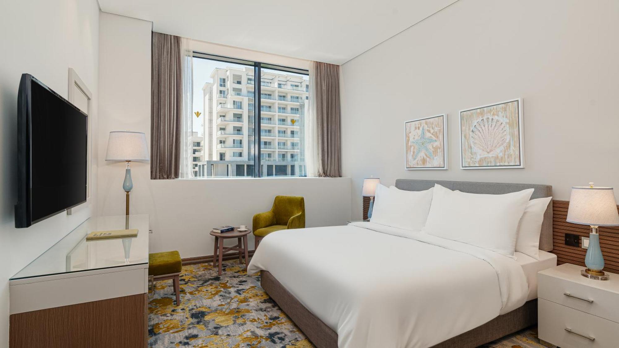 Rixos Premium Alamein El Alamein Rum bild A guest room at the hotel